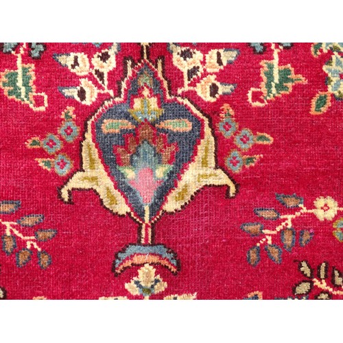 1277 - Carpet / Rug : A  North East Persian Meshed carpet, the red ground with central medallion having flo... 