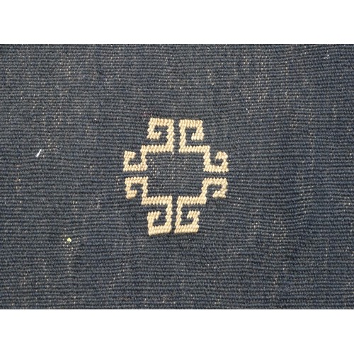 1285 - Carpet /  rug : A  North East Persian Sofreh Kilim, the dark ground with geometric motifs and chevro... 