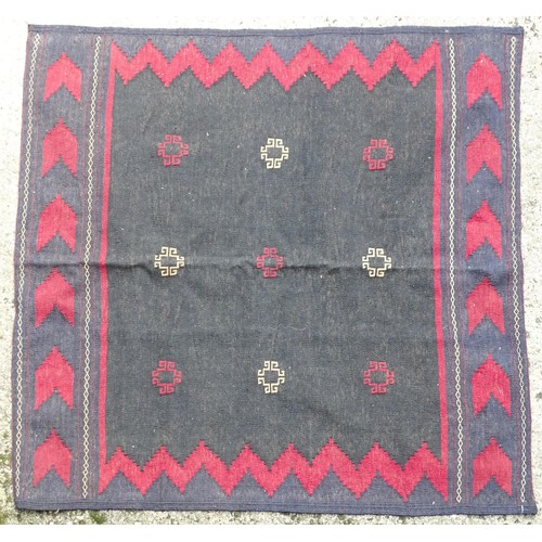 1285 - Carpet /  rug : A  North East Persian Sofreh Kilim, the dark ground with geometric motifs and chevro... 