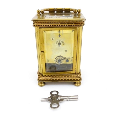 1296 - An early 20thC French carriage clock by Richard et Cie with Arabic numerals to dial and signed to fr... 