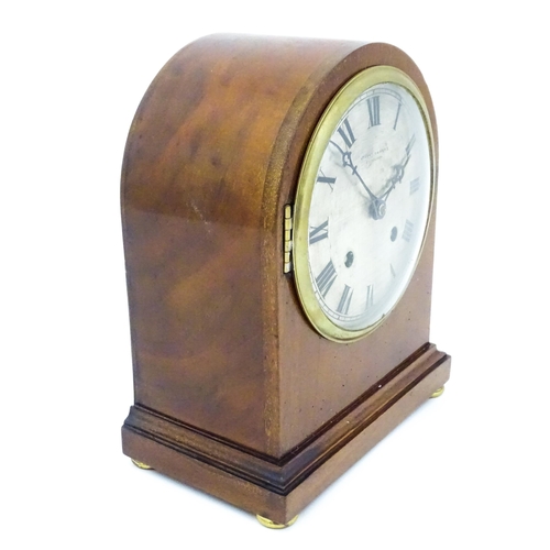 1299 - A mahogany cased mantle clock, the silvered dial with roman numerals and signed Robert Sawers Edinbu... 