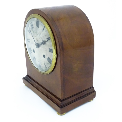 1299 - A mahogany cased mantle clock, the silvered dial with roman numerals and signed Robert Sawers Edinbu... 