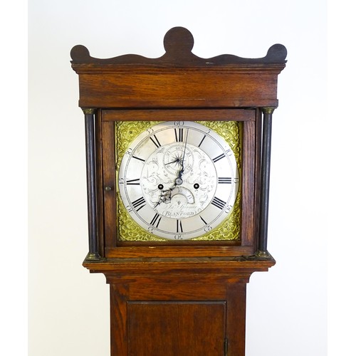 1307 - A late 18thC oak cased 8-day longcase clock. The silvered dial with Roman and Arabic numerals, subsi... 