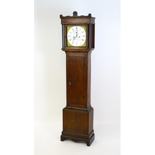 1307 - A late 18thC oak cased 8-day longcase clock. The silvered dial with Roman and Arabic numerals, subsi... 