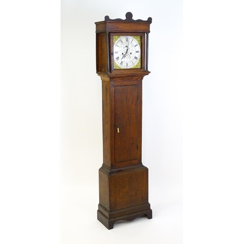 1307 - A late 18thC oak cased 8-day longcase clock. The silvered dial with Roman and Arabic numerals, subsi... 