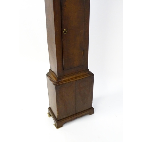 1309 - An early 19thC 30-hour oak cased long case clock. The painted dial signed Wm Nelson, Steeple Aston ?... 