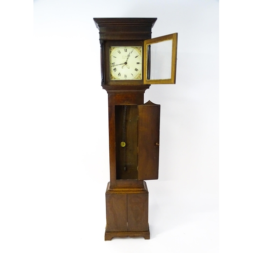 1309 - An early 19thC 30-hour oak cased long case clock. The painted dial signed Wm Nelson, Steeple Aston ?... 