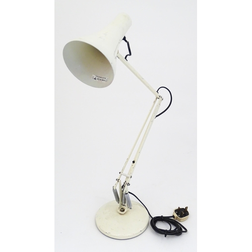 1319 - Four late 20thC Anglepoise table tamps, each with white finish and extending to approx 35