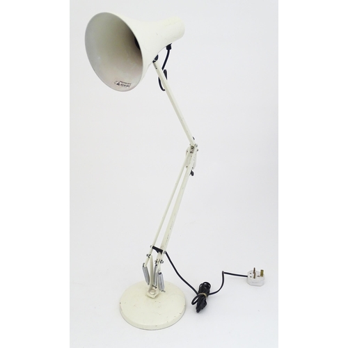 1319 - Four late 20thC Anglepoise table tamps, each with white finish and extending to approx 35