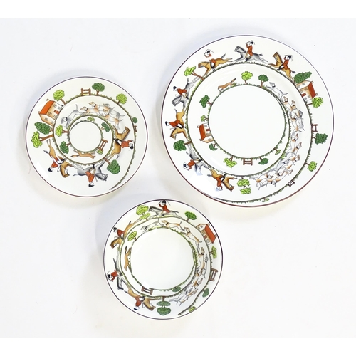 170 - A quantity of dinner wares, etc. decorated in the Hunting Scene pattern to include plates, mugs, bow... 