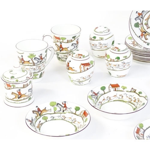 170 - A quantity of dinner wares, etc. decorated in the Hunting Scene pattern to include plates, mugs, bow... 