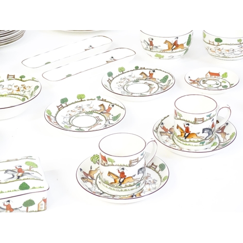 170 - A quantity of dinner wares, etc. decorated in the Hunting Scene pattern to include plates, mugs, bow... 