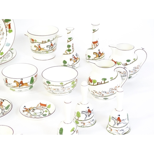 170 - A quantity of dinner wares, etc. decorated in the Hunting Scene pattern to include plates, mugs, bow... 