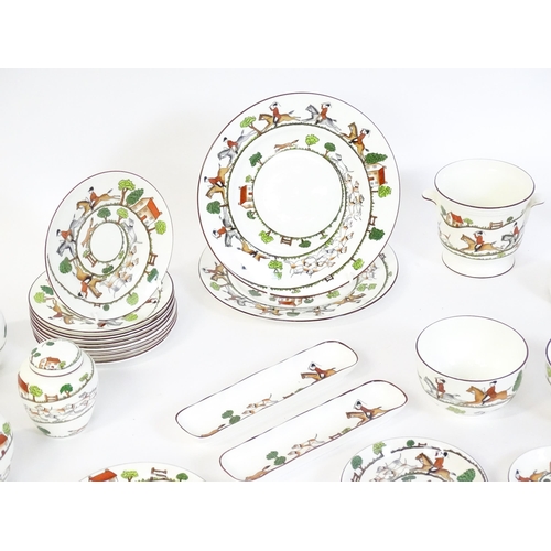 170 - A quantity of dinner wares, etc. decorated in the Hunting Scene pattern to include plates, mugs, bow... 