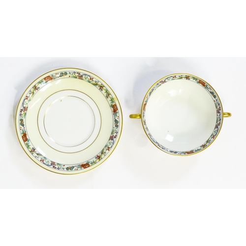 171 - A quantity of Haviland Limoges dinner wares with banded foliate border, to include plates, serving p... 