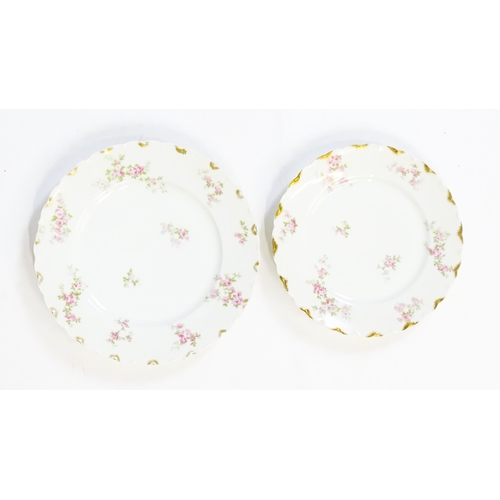 172 - A quantity of Haviland Limoges dinner wares with floral decoration and gilt borders to include plate... 