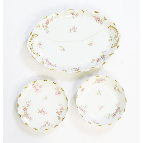 172 - A quantity of Haviland Limoges dinner wares with floral decoration and gilt borders to include plate... 