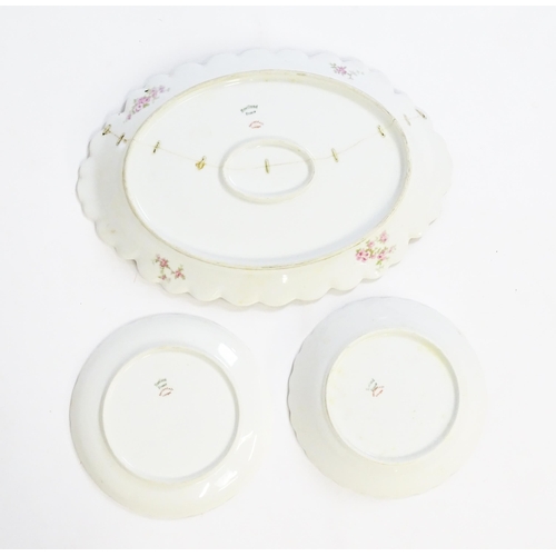 172 - A quantity of Haviland Limoges dinner wares with floral decoration and gilt borders to include plate... 