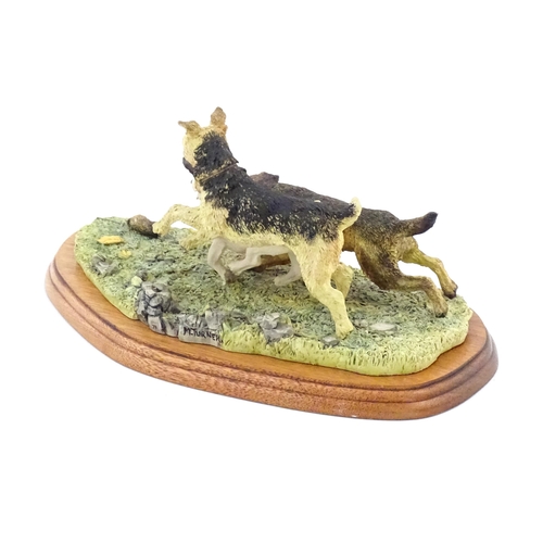 862 - A Border Fine Arts model Terrier Race, by Margaret Turner, model no. B0242. Within a glazed case. Ca... 