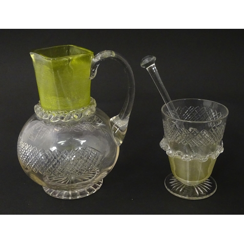 239 - A Victorian water jug and glass with banded yellow detail. Together with a glass stirrer. Jug approx... 