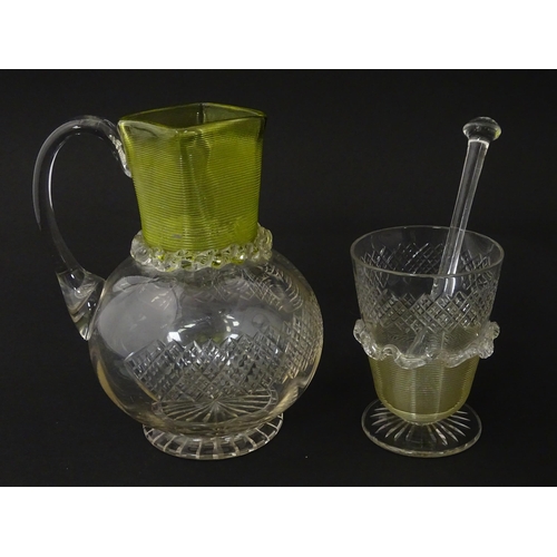 239 - A Victorian water jug and glass with banded yellow detail. Together with a glass stirrer. Jug approx... 