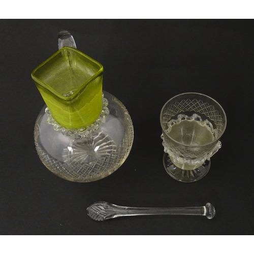 239 - A Victorian water jug and glass with banded yellow detail. Together with a glass stirrer. Jug approx... 