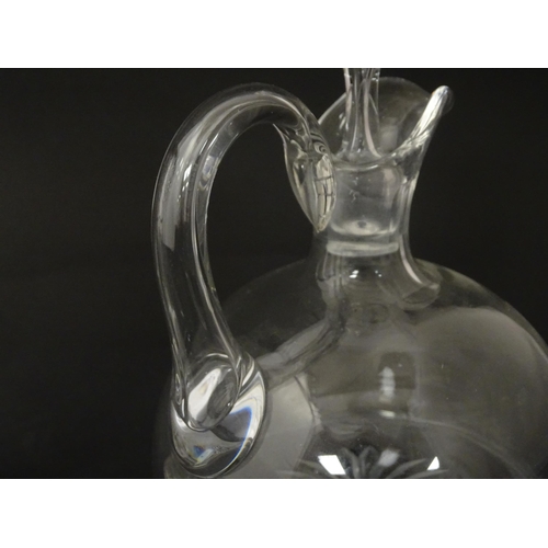 241 - A 19thC whisky water jug and stopper. Together with a 19thC cut glass vase with silver rim, hallmark... 