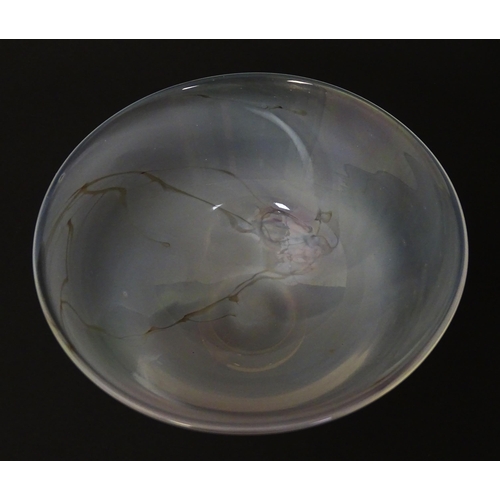 243 - An art glass bowl with marbled detail. Approx. 3