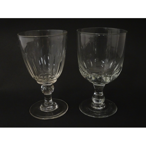 245 - Eight Georgian and later pedestal drinking glasses. Largest approx. 6