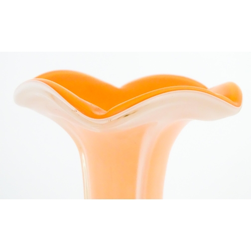 250 - A tall Empoli orange glass vase. Approx. 20