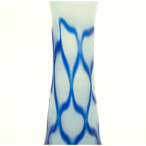 252 - A tall art glass vase with blue and turquoise detail. Approx. 16