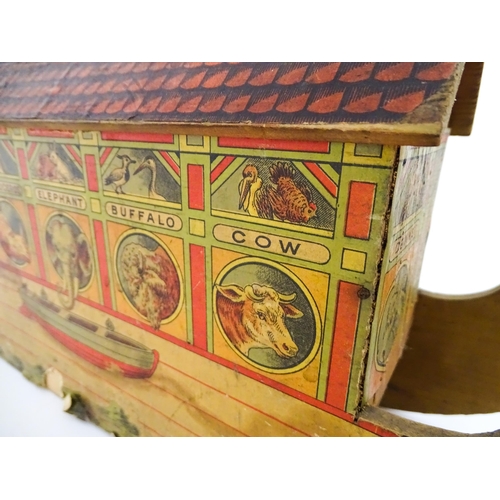 822 - Toys: An early 20thC German Noah's Ark and Animals, the wooden ark with pitched roof and lithograph ... 