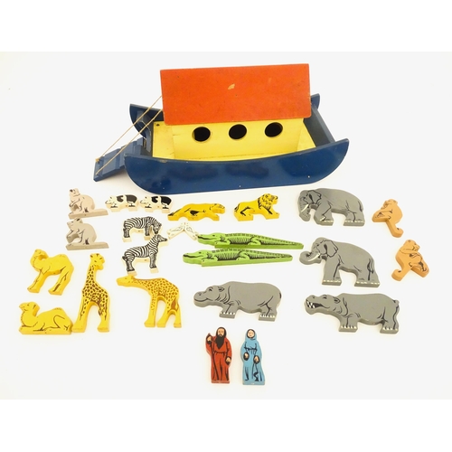 823 - Toys: A 20thC Tiger Toys wooden Noah's Ark with pitched roof, pierced windows and painted detail, wi... 