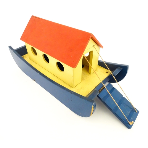 823 - Toys: A 20thC Tiger Toys wooden Noah's Ark with pitched roof, pierced windows and painted detail, wi... 