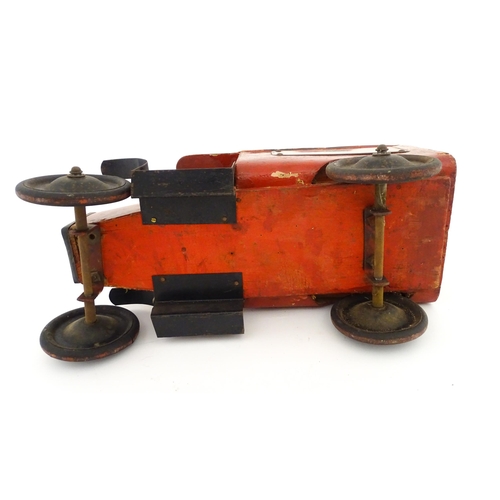 824 - Toy: An early 20thC Triangtois / Triang wooden Royal Mail Ford van, painted red with black and yello... 