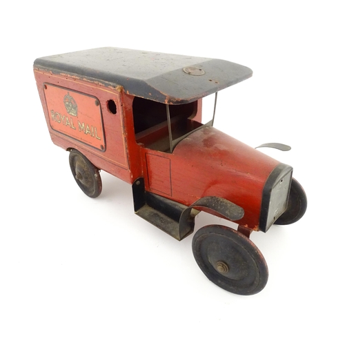 824 - Toy: An early 20thC Triangtois / Triang wooden Royal Mail Ford van, painted red with black and yello... 