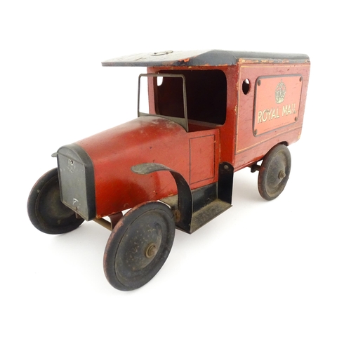 824 - Toy: An early 20thC Triangtois / Triang wooden Royal Mail Ford van, painted red with black and yello... 