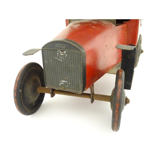 824 - Toy: An early 20thC Triangtois / Triang wooden Royal Mail Ford van, painted red with black and yello... 