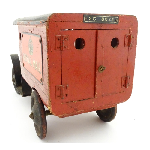 824 - Toy: An early 20thC Triangtois / Triang wooden Royal Mail Ford van, painted red with black and yello... 