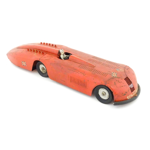 828 - Toy: An early 20thC American Kingsbury scale model clockwork race car Sunbeam with Dunlop Cord Racin... 