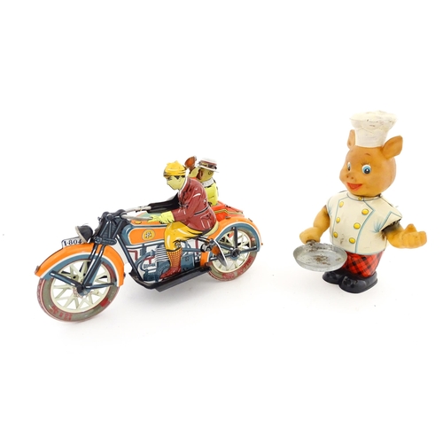 831 - Toys: Two 20thC tinplate clockwork toys to include a motorbike and sidecar, and a Japanese tinplate ... 