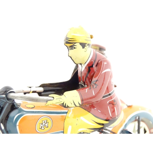 831 - Toys: Two 20thC tinplate clockwork toys to include a motorbike and sidecar, and a Japanese tinplate ... 