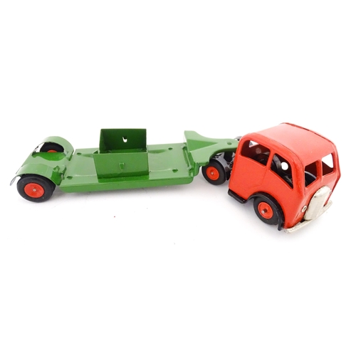 832 - Toys: Four 20thC tinplate scale model vehicles comprising a Triang Minic Mechanical Horse and Traile... 