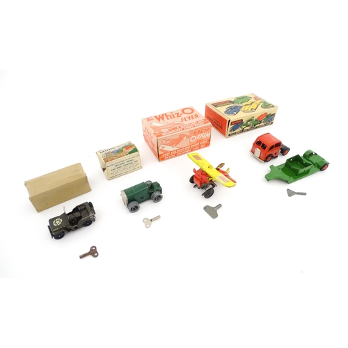 832 - Toys: Four 20thC tinplate scale model vehicles comprising a Triang Minic Mechanical Horse and Traile... 