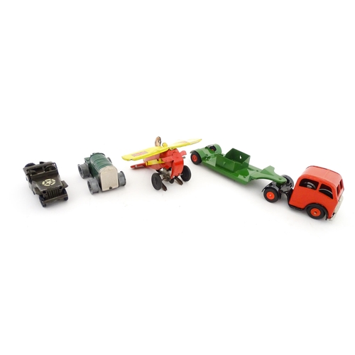 832 - Toys: Four 20thC tinplate scale model vehicles comprising a Triang Minic Mechanical Horse and Traile... 