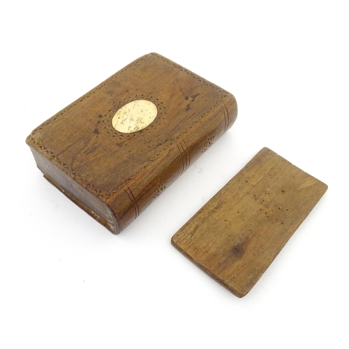 835 - Toys: A quantity of 19thC prisoner of war carved bone dominoes within a wooden box of book form. Dom... 