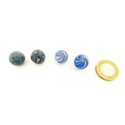 836 - Toys: A quantity of assorted vintage marbles, many with colours twists, etc. Contained within a Cadb... 