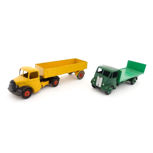 841 - Toys: A quantity of die cast scale model Dinky Toys / Dinky Supertoys to include Guy Flat Truck with... 