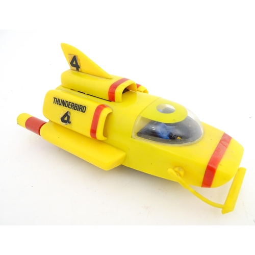 844 - Toy: A 20thC plastic scale model battery operated Thunderbird 4 by J. Rosenthal Toys Ltd. (JR 21 Toy... 