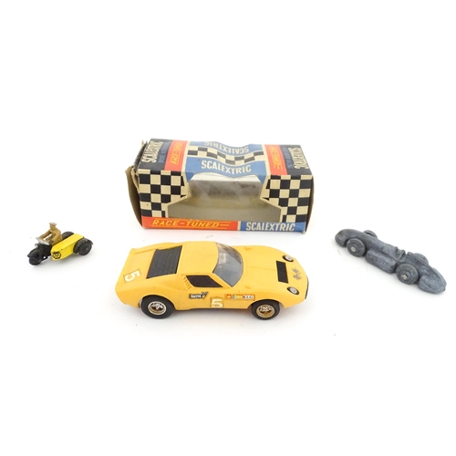 847 - Toys: Three assorted scale model vehicles to include a boxed Scalextric C9 Ferrari GP race car in ye... 